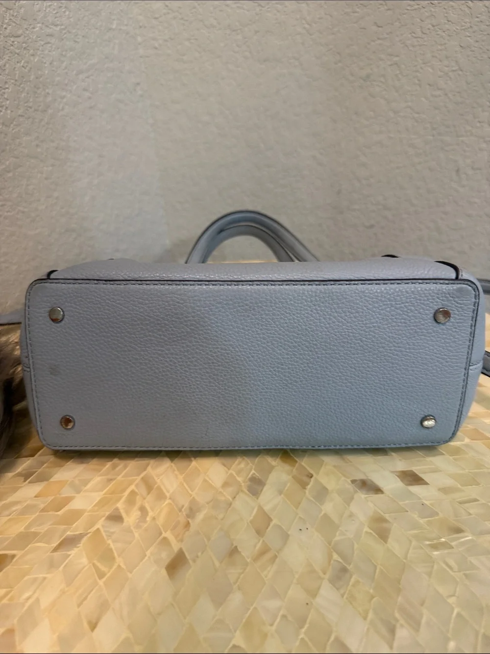 Kate Spade pale blue pebbled leather satchel with charm